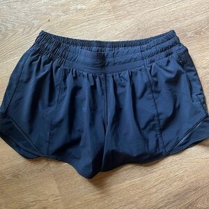 Lululemon Navy Hotty Hot Shorts Low Rise 8 Tall 4 inch Inseam